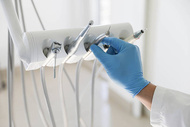 Professional Tooth Extraction technician working in Grimes, IA